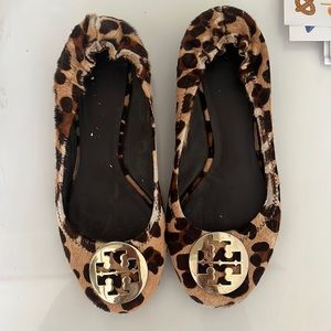 Tory Burch reva flats - leopard print faux hair with gold hardware.